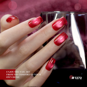 Crimson allure red cat eye gel polish on square nails showing magnetic shimmer effect professional salon quality