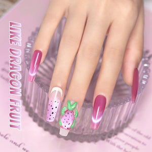 Like Dragon Fruit cat eye gel polish on nails showing fruit-themed nail art dragon fruit design playful summer manicure
