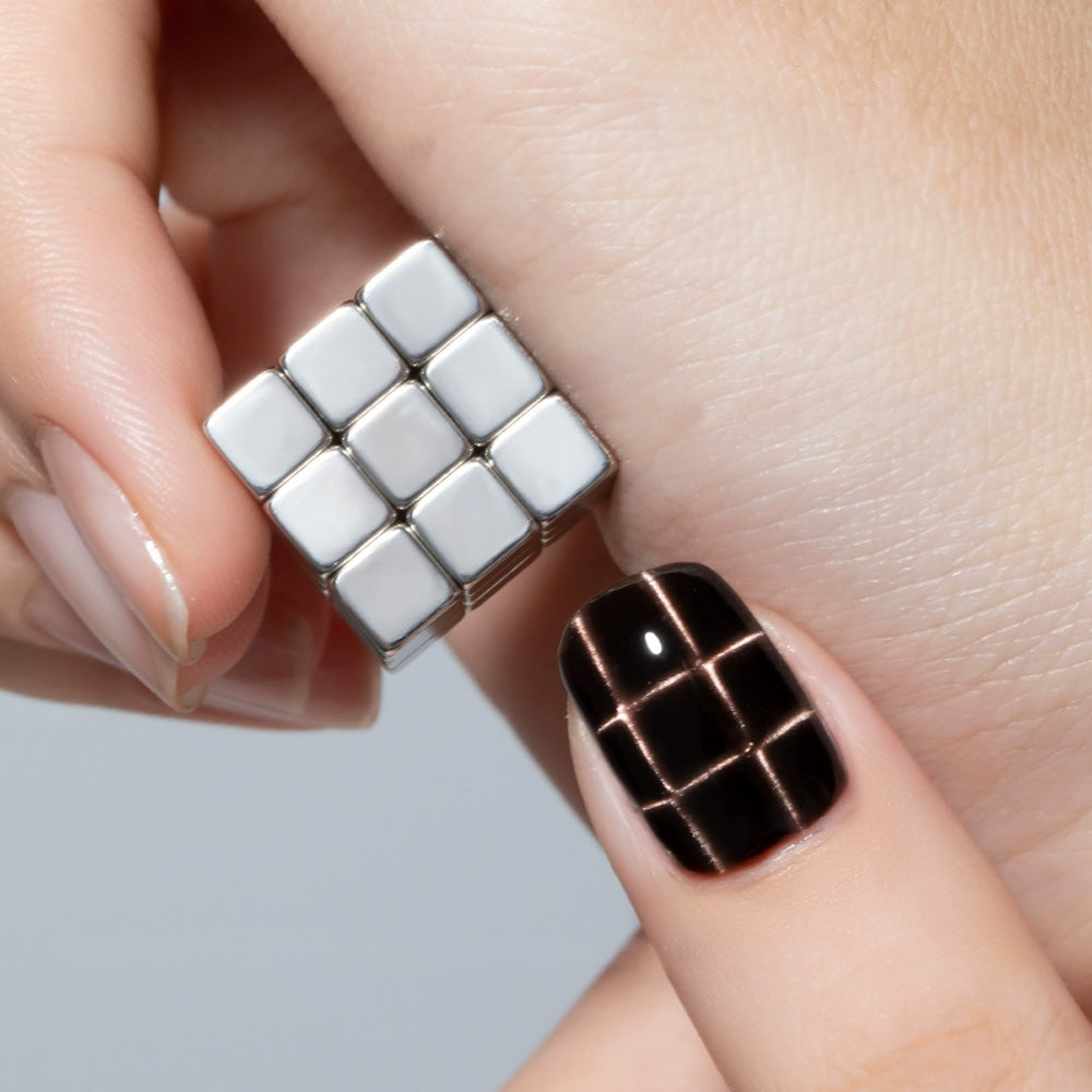 Rubik's cube formation with 27-piece magnet set - creates checkerboard cat eye pattern effect
