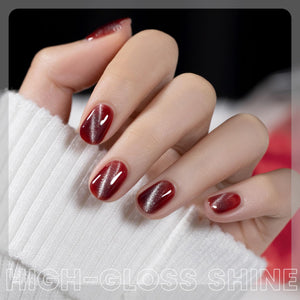 High-gloss shine silver white cat eye gel polish amber red jelly layering effect captivating depth light-catching vibrancy
