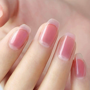 Sheer pink jelly manicure long coffin nails natural healthy glow translucent finish on hand

